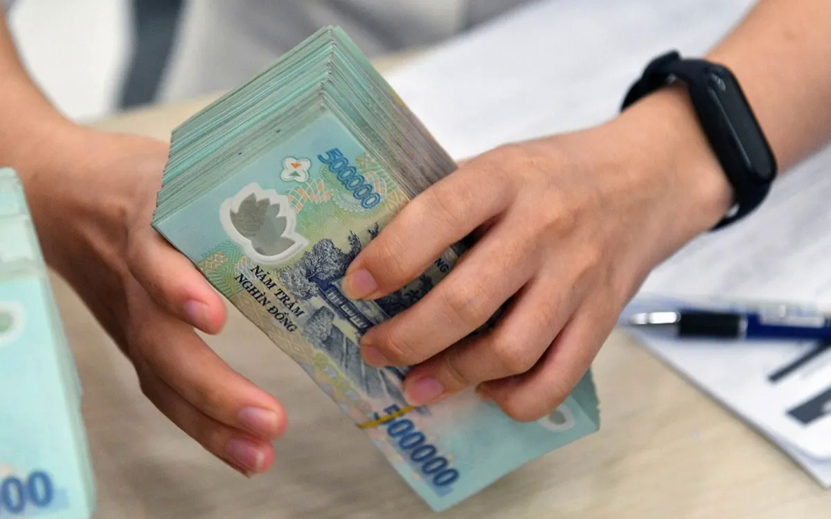 Hóa đơn 5 triệu đồng và tác động của chính sách thanh toán không dùng tiền mặt đến doanh nghiệp - Ảnh 1.