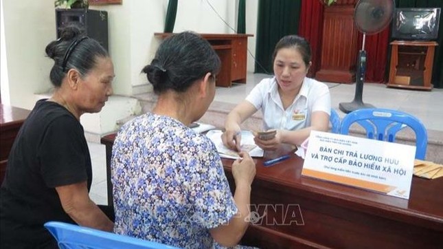 Vì sao lùi lịch trả lương hưu, trợ cấp tháng 3?- Ảnh 1.