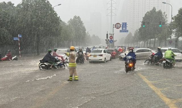 Ngày mai, toàn miền Bắc có mưa to- Ảnh 1.