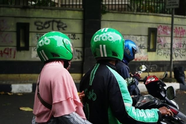 Nóng: Grab sắp thâu tóm Gojek ngay trong năm nay- Ảnh 2.