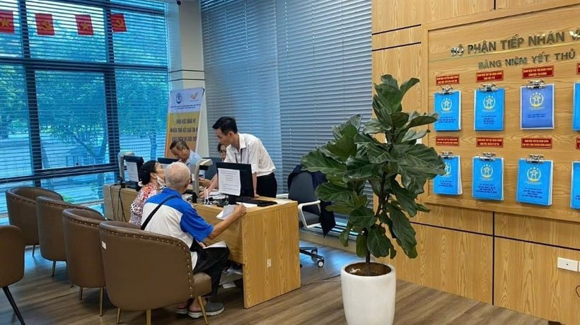 Hà Nội triển khai công tác hộ tịch, nuôi con nuôi khi tổ chức chính quyền địa phương 2 cấp - Ảnh 1.