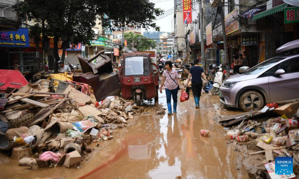 Trung Quốc kích hoạt ứng phó khẩn cấp lũ lụt - Ảnh 1.