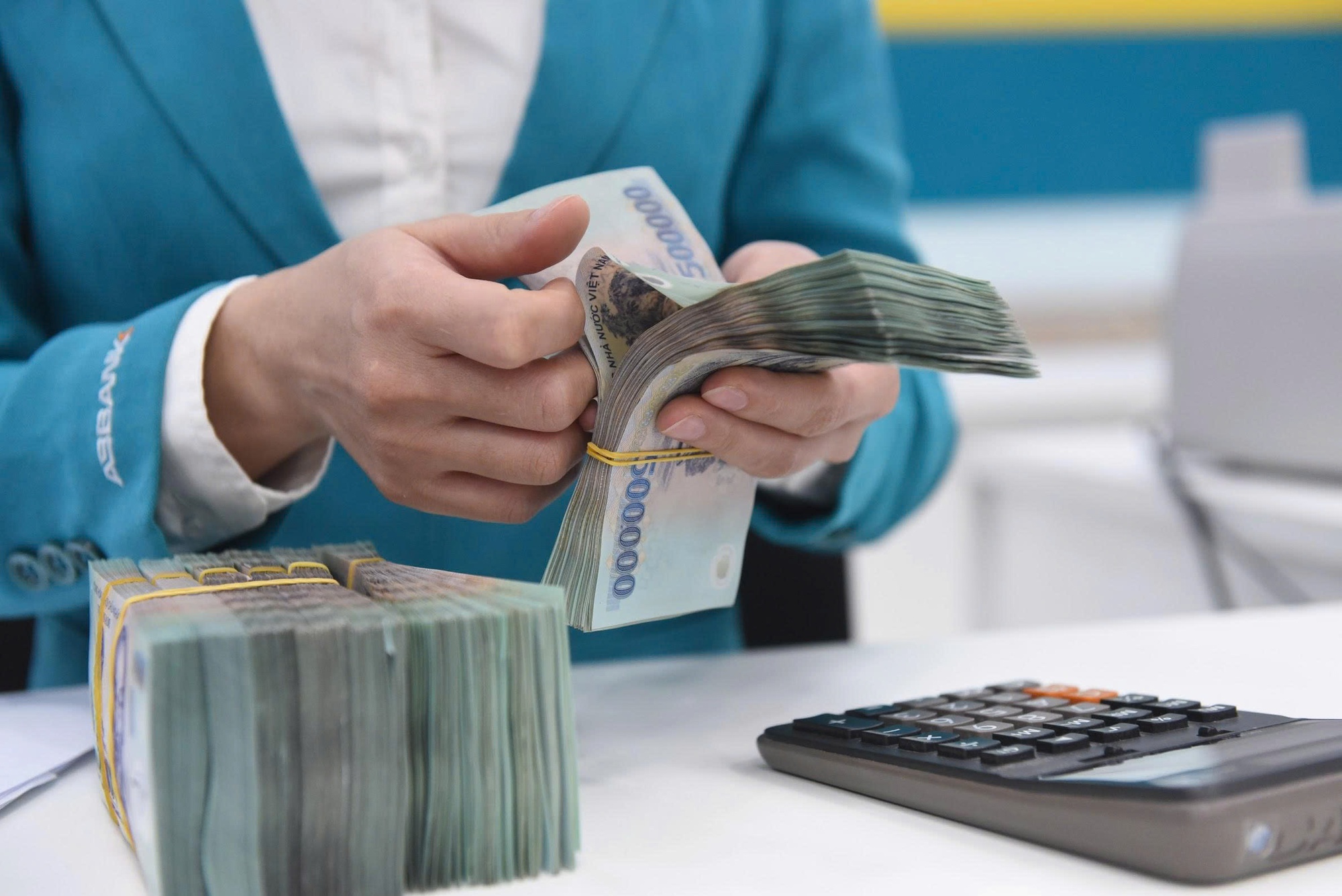 Muốn chia lợi nhuận bằng tiền mặt ngân hàng phải vượt '4 lớp vốn' - Ảnh 1.