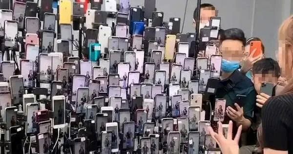 Cảnh sát bao vây căn nhà có 20.000 chiếc điện thoại phát sáng hoạt động, bí mật về kho hàng và 17 tỷ đồng bị phát hiện- Ảnh 1.