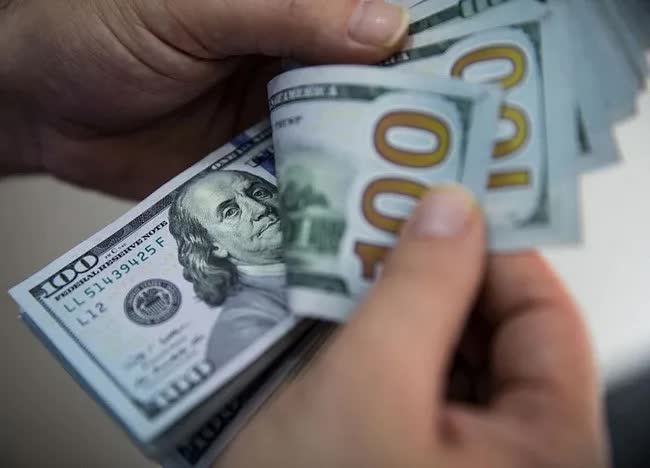 Tuần nhiều giông bão của đồng USD - Ảnh 1.