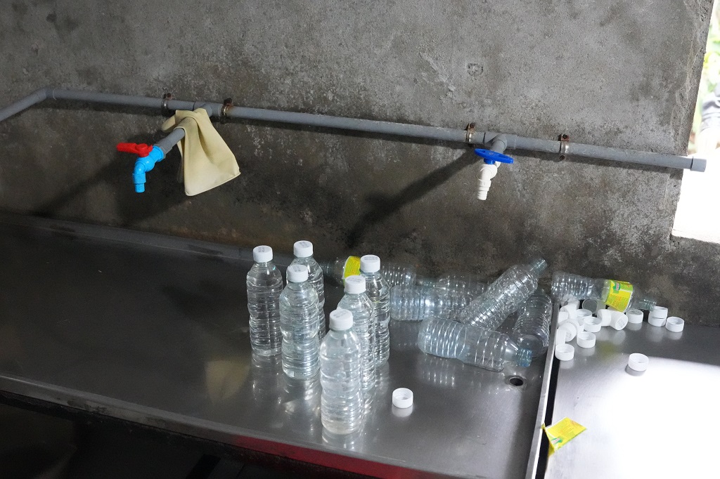 Triệt phá đường dây sản xuất giấm giả từ axit công nghiệp tại Nghệ An năm 2026 - Ảnh 4.