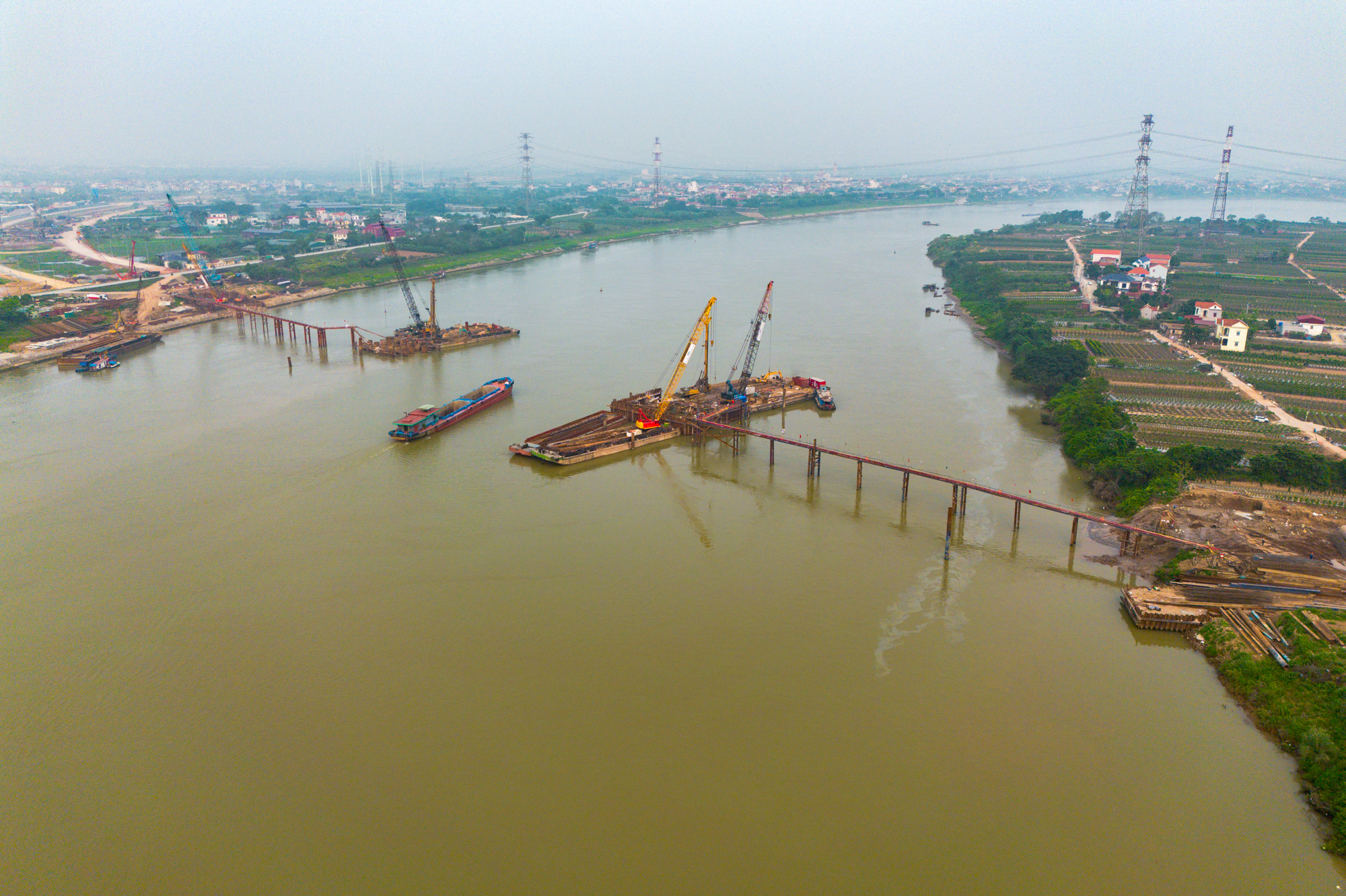 Cận cảnh 2 cây cầu trị giá 16.000 tỷ đồng, kết nối các khu đô thị hàng chục tỷ USD, chiếm 50% nguồn cung căn hộ Hà Nội - Ảnh 6.