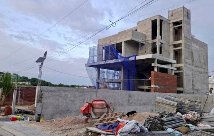 Bộ xây dựng đề xuất miễn giấy phép xây dựng nhà ở dưới 7 tầng năm 2026 - Ảnh 1.