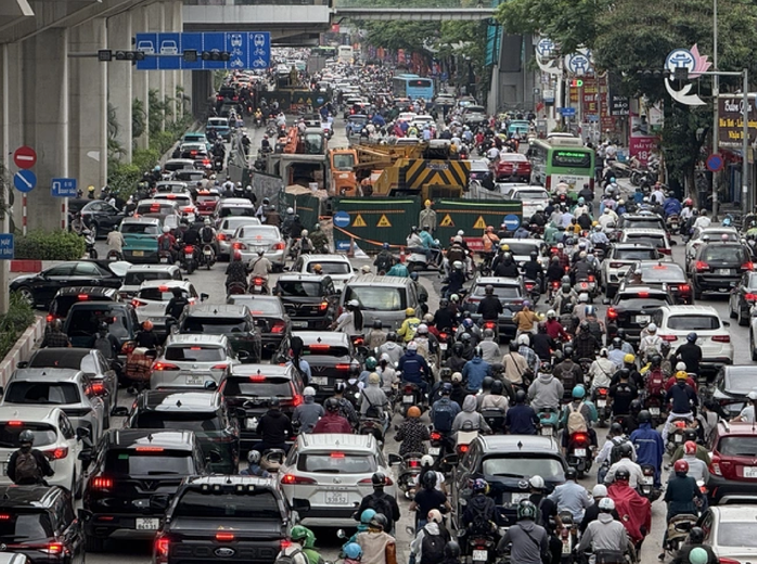 Hà Nội thu phí đường bộ vào nội đô từ năm 2028 nhằm giảm ùn tắc - Ảnh 1. Hà Nội thu phí đường bộ vào nội đô từ năm 2028 nhằm giảm ùn tắc - Ảnh 1.