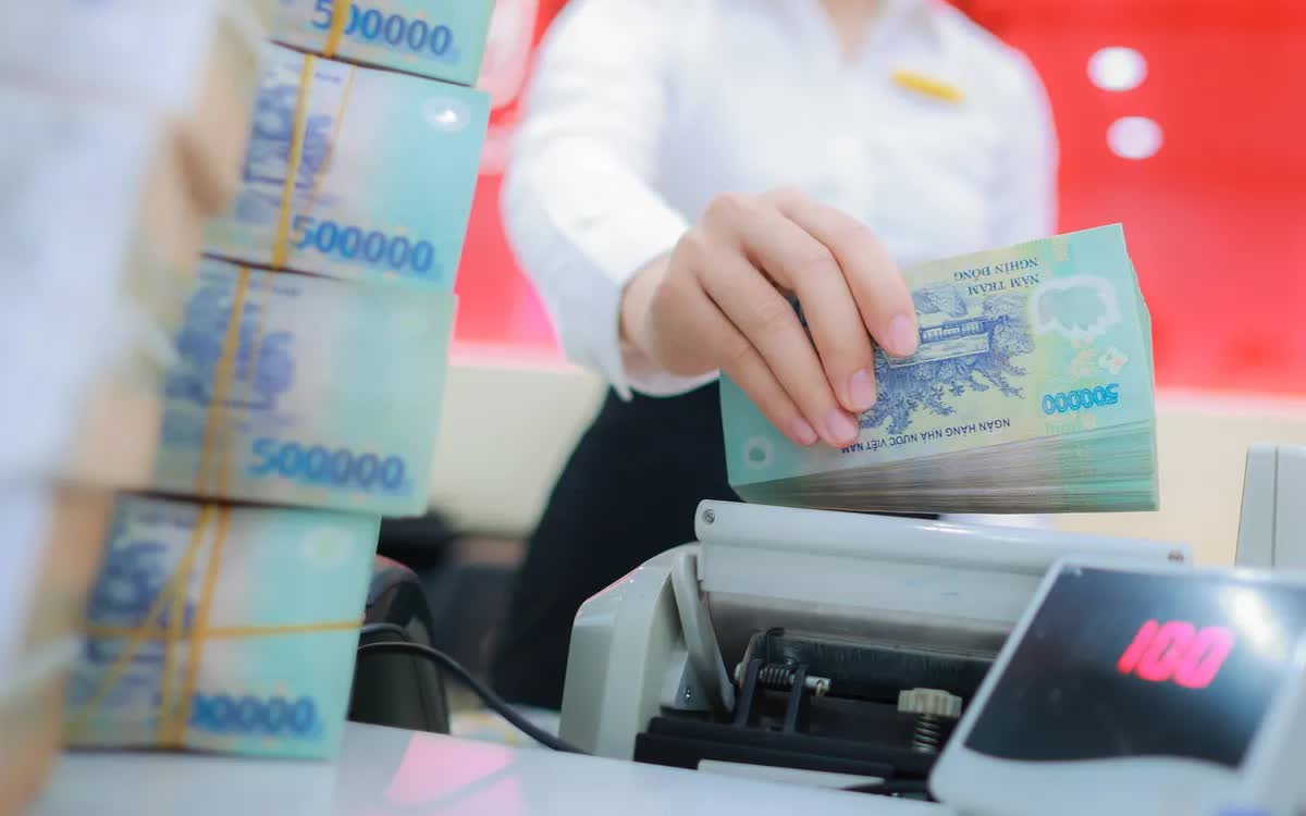 Người dân gửi hơn 11 triệu tỷ đồng vào ngân hàng - Ảnh 1.