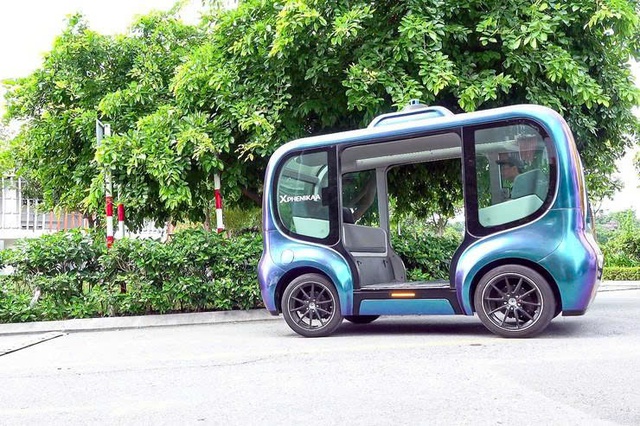 Hà Nội thử nghiệm xe buýt tự hành và robot giao hàng năm 2026 - Ảnh 1. Hà Nội thử nghiệm xe buýt tự hành và robot giao hàng năm 2026 - Ảnh 1.