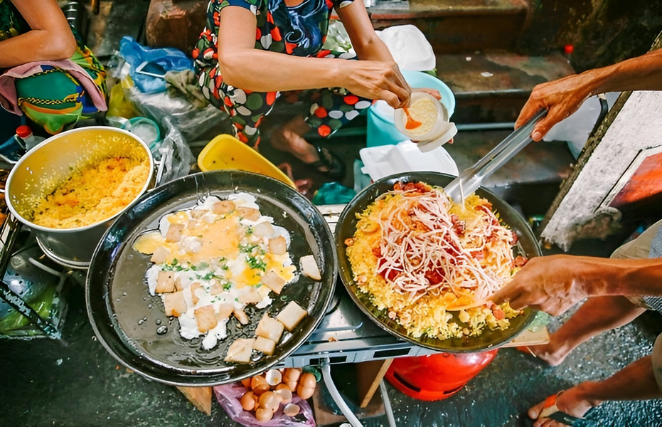 Vượt qua Kuala Lumpur và Jakarta, một thành phố Việt Nam bất ngờ đứng top 1 thế giới về ẩm thực đường phố - Ảnh 4.