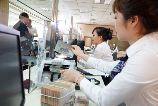 Hai “ông lớn” ngân hàng tăng lãi suất tiền gửi - Ảnh 1. Hai “ông lớn” ngân hàng tăng lãi suất tiền gửi - Ảnh 1.