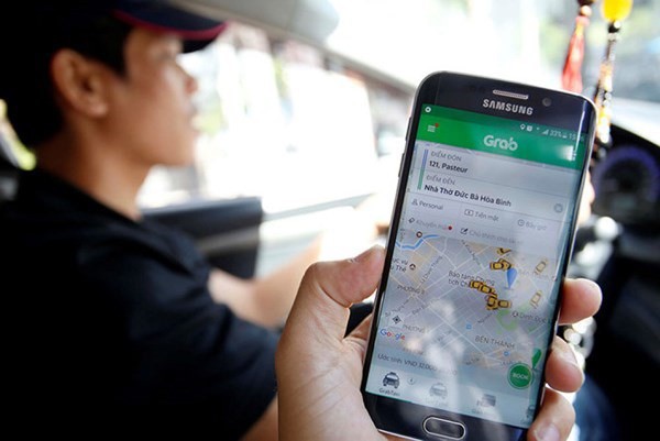  Từ bây giờ hãy xem Uber, Grab như taxi điện tử  - Ảnh 1.