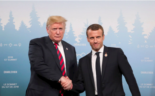 Tay ông Trump hằn đỏ sau cú bắt tay với Tổng thống Pháp - Ảnh 4.