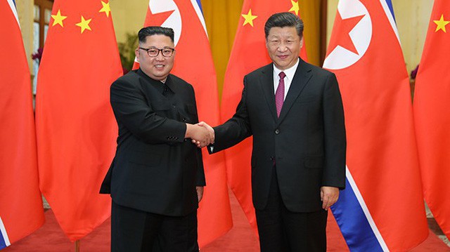 3 chuyến thăm Trung Quốc từ bí mật tới công khai, ông Kim Jong-un phát đi thông điệp gì? - Ảnh 1.