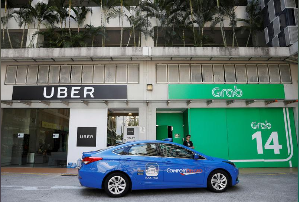Singapore đề xuất hủy vụ sáp nhập của Uber và Grab - Ảnh 1.