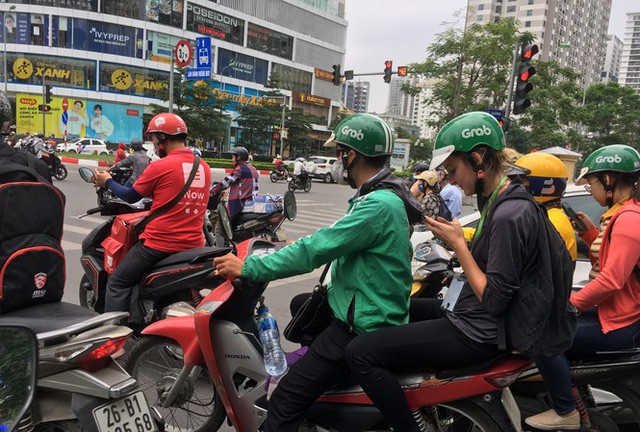  Cuộc chiến giành tài xế của Grab, Be, Go Viet, FastGo...  - Ảnh 1.