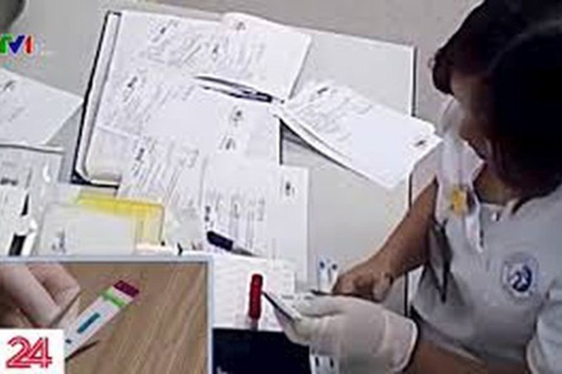 Công an Hà Nội xác minh vụ cắt đôi que thử HIV tại bệnh viện Xanh-pôn - Ảnh 1.