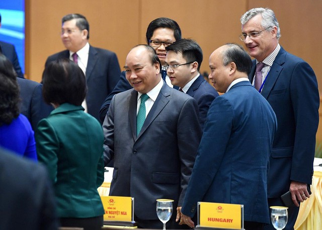 Những khoảnh khắc ấn tượng trong lễ ký kết lịch sử giữa Việt Nam và EU - Ảnh 2. Những khoảnh khắc ấn tượng trong lễ ký kết lịch sử giữa Việt Nam và EU - Ảnh 2.