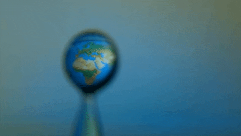 Nhồi nhét bản đồ thế giới vào trong giọt nước bé tí: Video chuyển động siêu chậm nhìn như phép màu! - Ảnh 1.