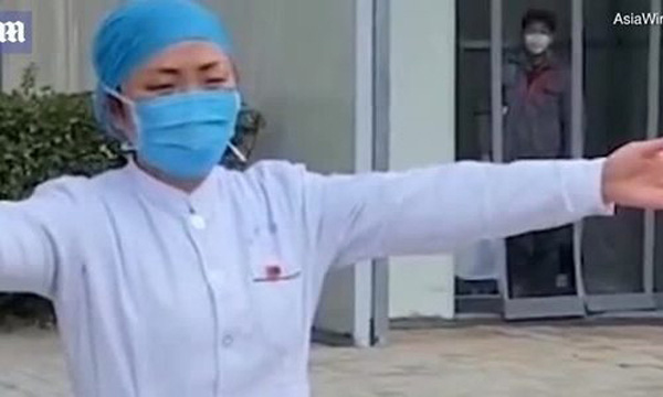 Xúc động nữ y tá Trung Quốc mùa dịch corona: Không ăn uống, nhịn vệ sinh suốt 12 tiếng, làm việc quên cả sinh nhật mình - Ảnh 2.