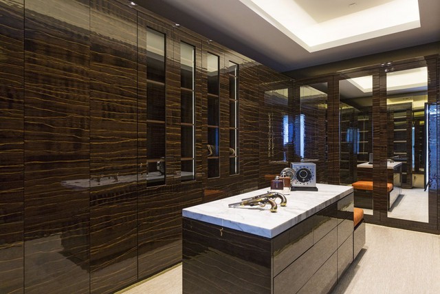 The master bedrooms closets are bigger than most New York apartments, designed to be both his ...