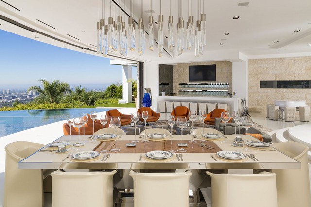 The dining room can easily fit eight guests. The home was designed for entertaining.