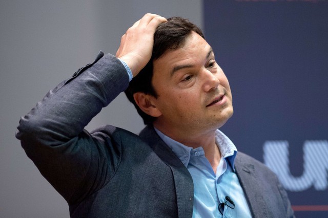 French economist Thomas Piketty speaks to students and guests during a presentation at Kings College, central London, on April 30, 2014. Piketty said that he hoped to create a 