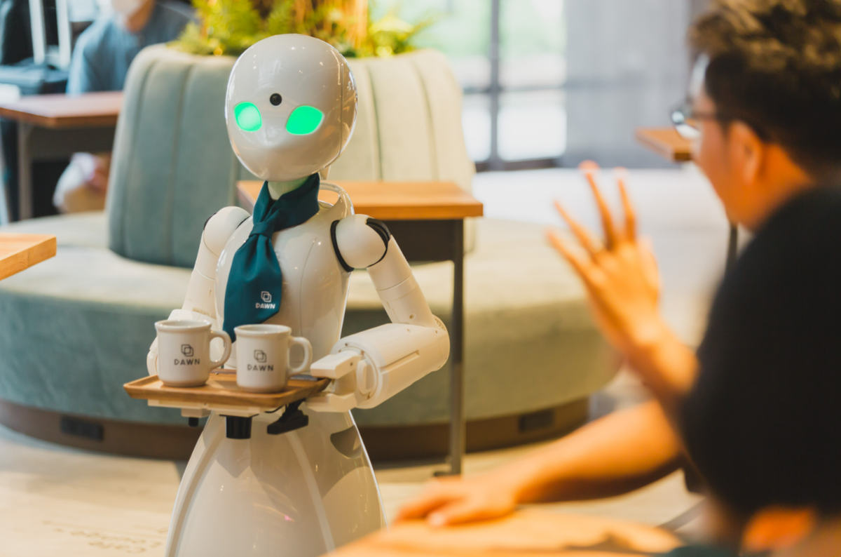 Quán cà phê tuyển bệnh nhân điều khiển robot phục vụ: Tương lai làm việc mới cho những người không thể xuống giường?
