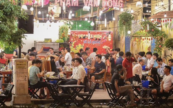 Thưởng thức những món ăn ngon tuyệt tại phố nhậu Phạm Văn Đồng và hòa mình vào bầu không khí sôi động, đầy màu sắc của khu vực ẩm thực này.