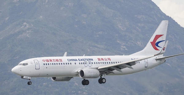The husband of the Chinese flight attendant on the plane was anxiously waiting for news