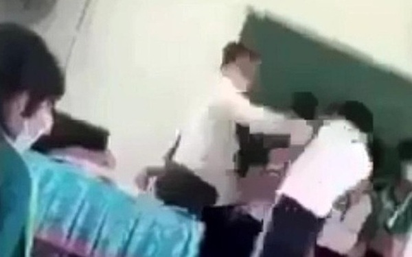 Discipline 2 teachers slapping students, dropping books on the ground