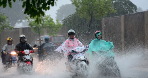 Không khí lạnh tràn về, Hà Nội có mưa lớn trên diện rộng