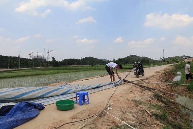 Người dân Nam Sơn dỡ lều bạt, xe chở rác bắt đầu hoạt động trở lại - Ảnh 4.