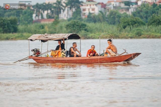 Ảnh, clip: Nước sông Hồng dâng cao, người dân Hà Nội bì bõm tập thể dục - Ảnh 18.