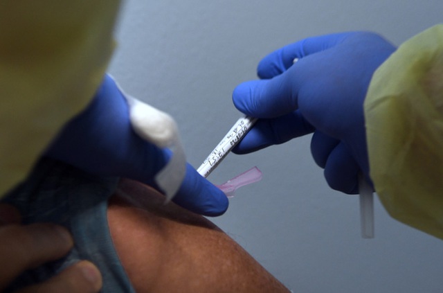Công bố giá bán vắc-xin COVID-19 triển vọng nhất nước Mỹ: 860.000 đồng mỗi liều, mỗi người phải tiêm 2 mũi - Ảnh 1.