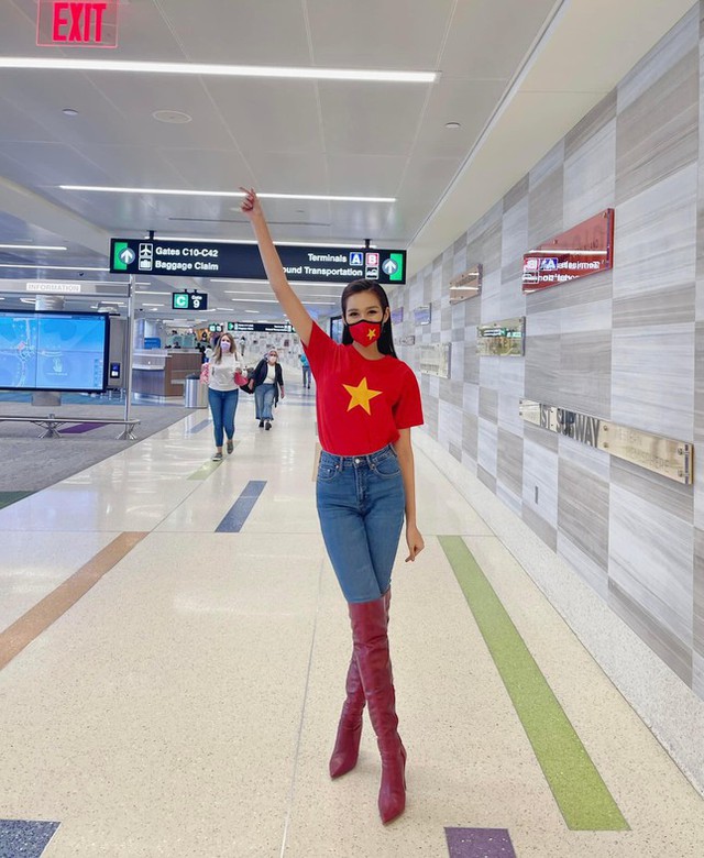 Đỗ Thị Hà diện áo cờ đỏ sao vàng nổi bật ở sân bay Mỹ, chuẩn bị nhập cuộc tại Miss World - Ảnh 2.
