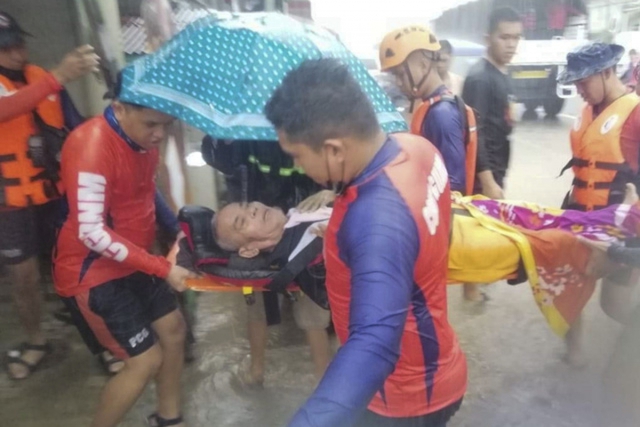 Hình ảnh người dân Philippines sơ tán khẩn cấp do siêu bão Rai đổ bộ - Ảnh 8.