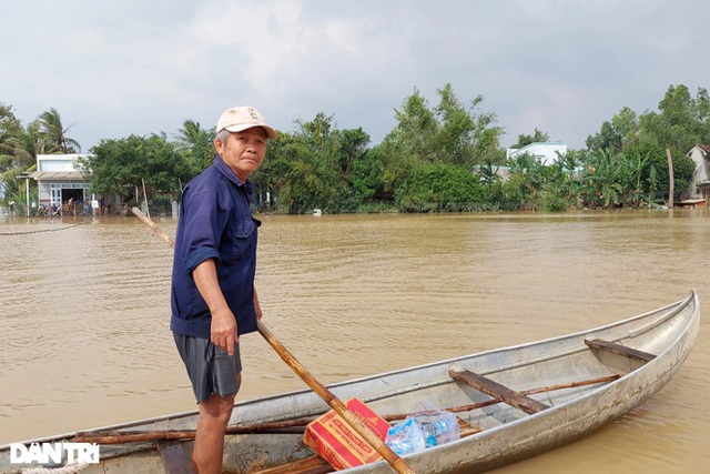 Những hình ảnh khó quên trong 3 ngày mưa lớn tại miền Trung: Ô tô cưỡi lũ, thủy điện xả kinh hoàng, dân lội nước vẫy tay gọi cứu trợ - Ảnh 19.