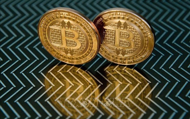 Đồng tiền kỹ thuật số bitcoin. Ảnh: AFP/TTXVN