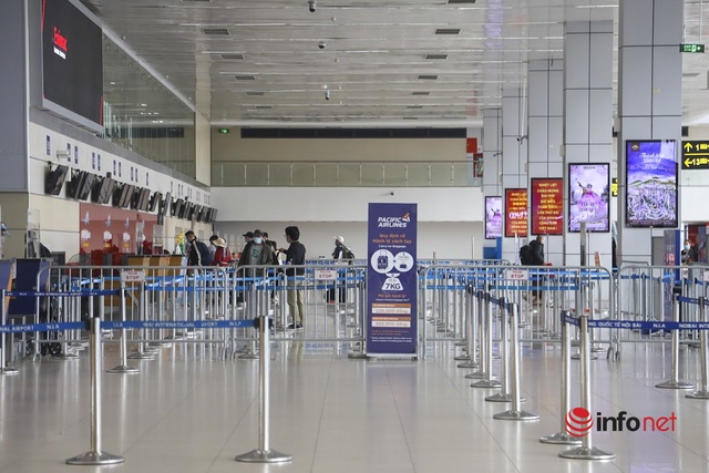 Hơn 20% khách hủy chuyến, sân bay Nội Bài đìu hiu, nhiều xe bus vào nội thành trống không - Ảnh 11.