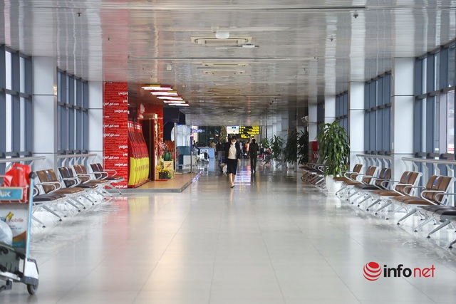 Hơn 20% khách hủy chuyến, sân bay Nội Bài đìu hiu, nhiều xe bus vào nội thành trống không - Ảnh 4.