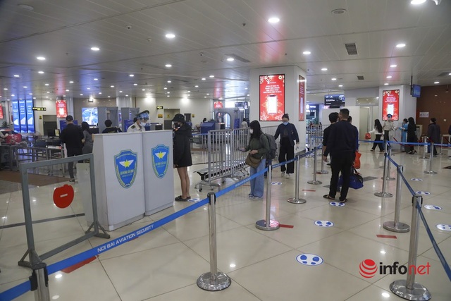 Hơn 20% khách hủy chuyến, sân bay Nội Bài đìu hiu, nhiều xe bus vào nội thành trống không - Ảnh 6.