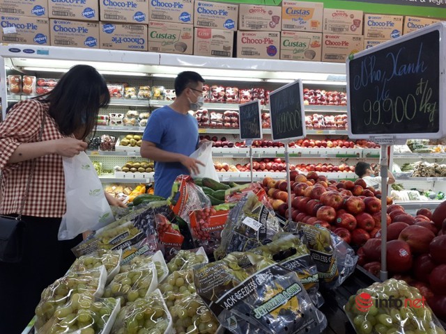 Hà Nội: Dân đổ xô về quê, đi chơi ngày lễ, siêu thị vắng khách, chợ ế hàng - Ảnh 7.