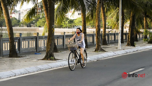 Bấp chấp lệnh cấm, nhiều người dân Hà Nội vẫn ra đường tập thể dục - Ảnh 6.