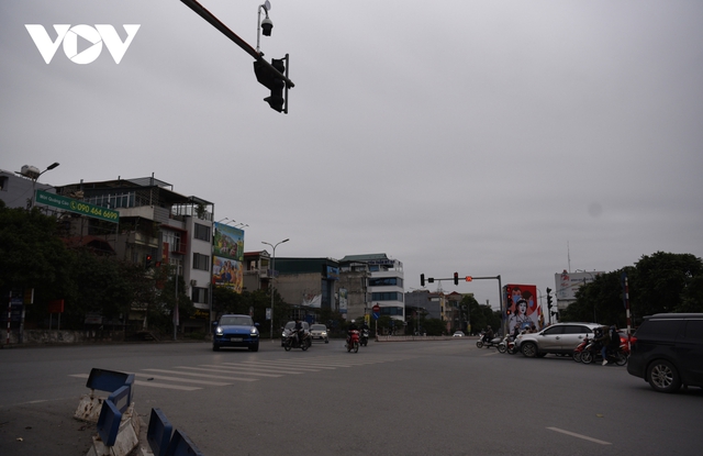 Đường phố Hà Nội vắng lặng trong ngày cuối cùng năm Tân Sửu - Ảnh 14.