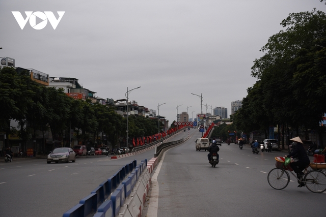 Đường phố Hà Nội vắng lặng trong ngày cuối cùng năm Tân Sửu - Ảnh 13.