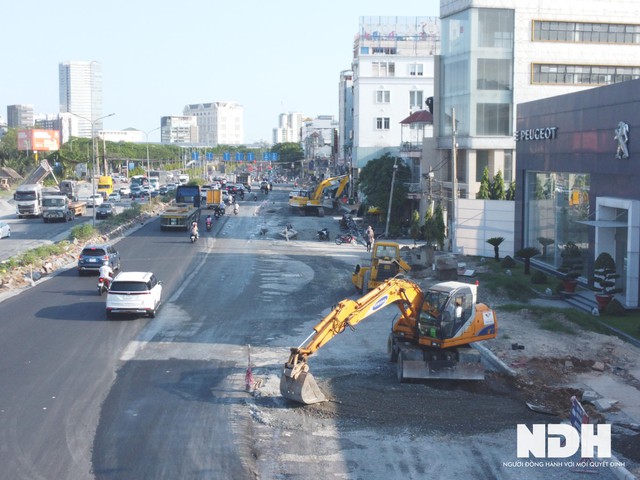 TP HCM: Dự án mở rộng đại lộ Nguyễn Văn Linh lên 10 làn xe sắp hoàn thành - Ảnh 2.