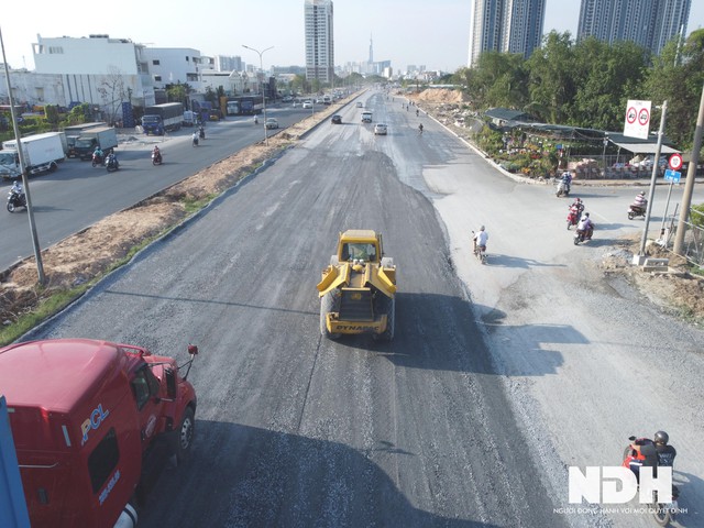 TP HCM: Dự án mở rộng đại lộ Nguyễn Văn Linh lên 10 làn xe sắp hoàn thành - Ảnh 11.